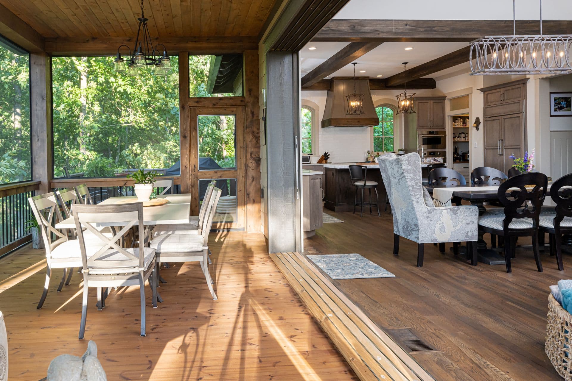 Sunlit outdoor dining area opening to the garden