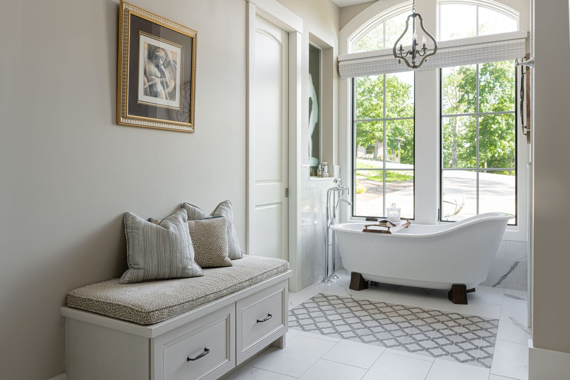 French country bathroom with a classic freestanding tub