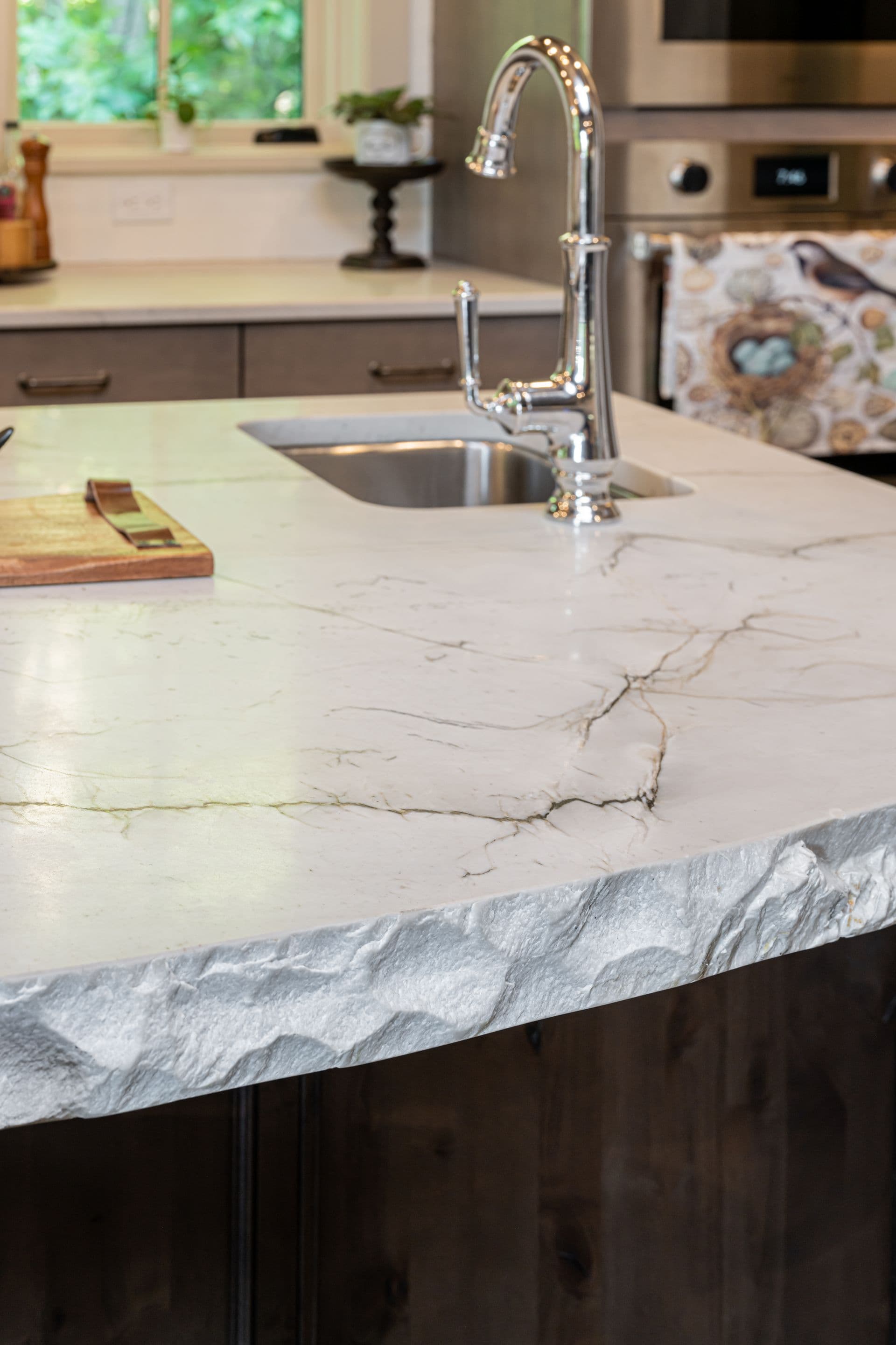 Close detail of natural stone and kitchen finishes