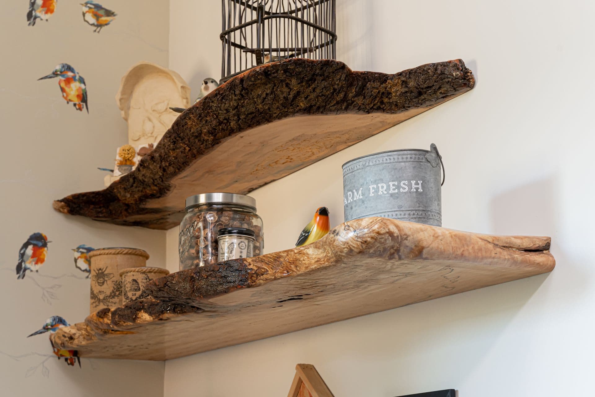 Open shelving styled with everyday kitchen and laundry essentials