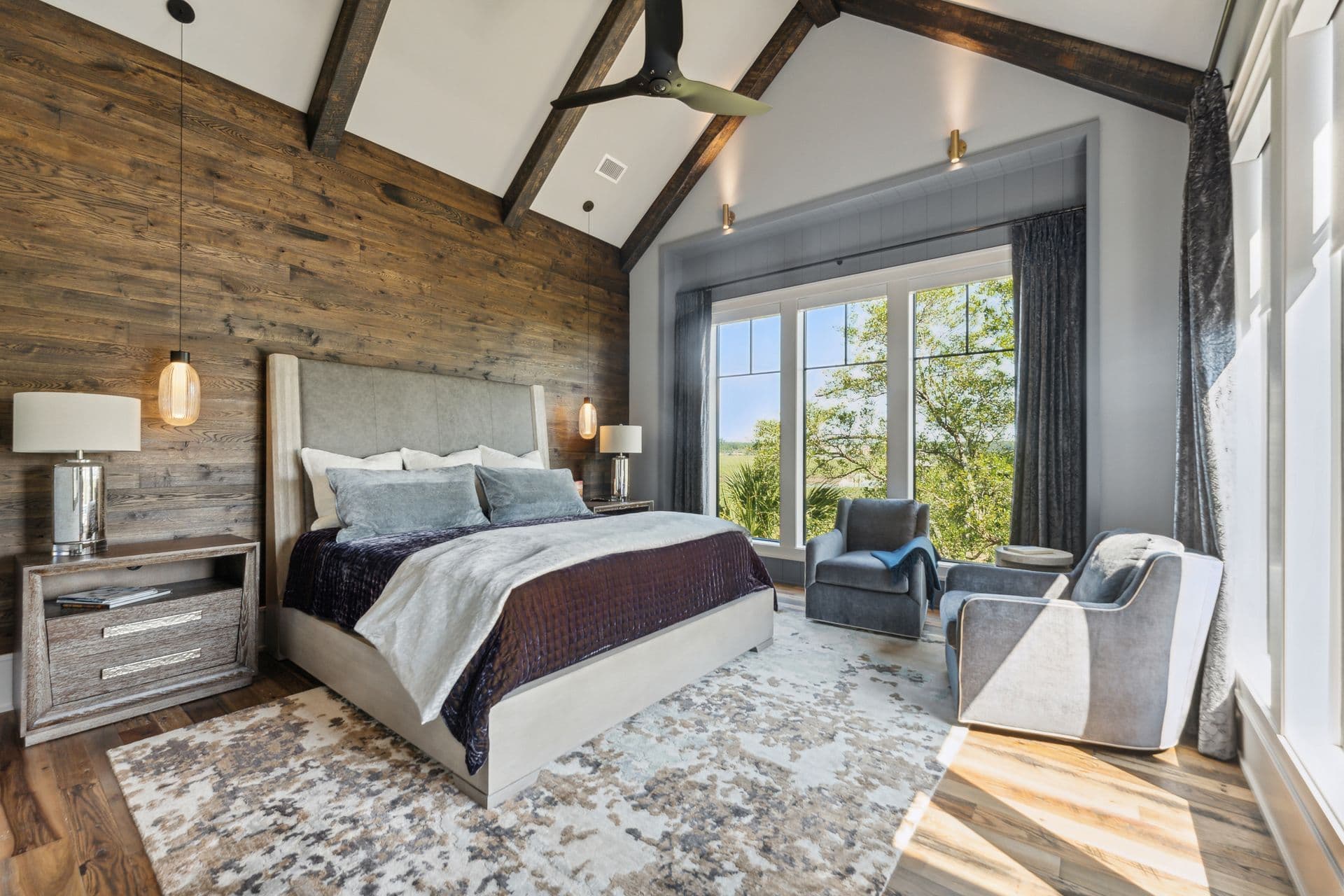 A calm bedroom with an exposed brick wall