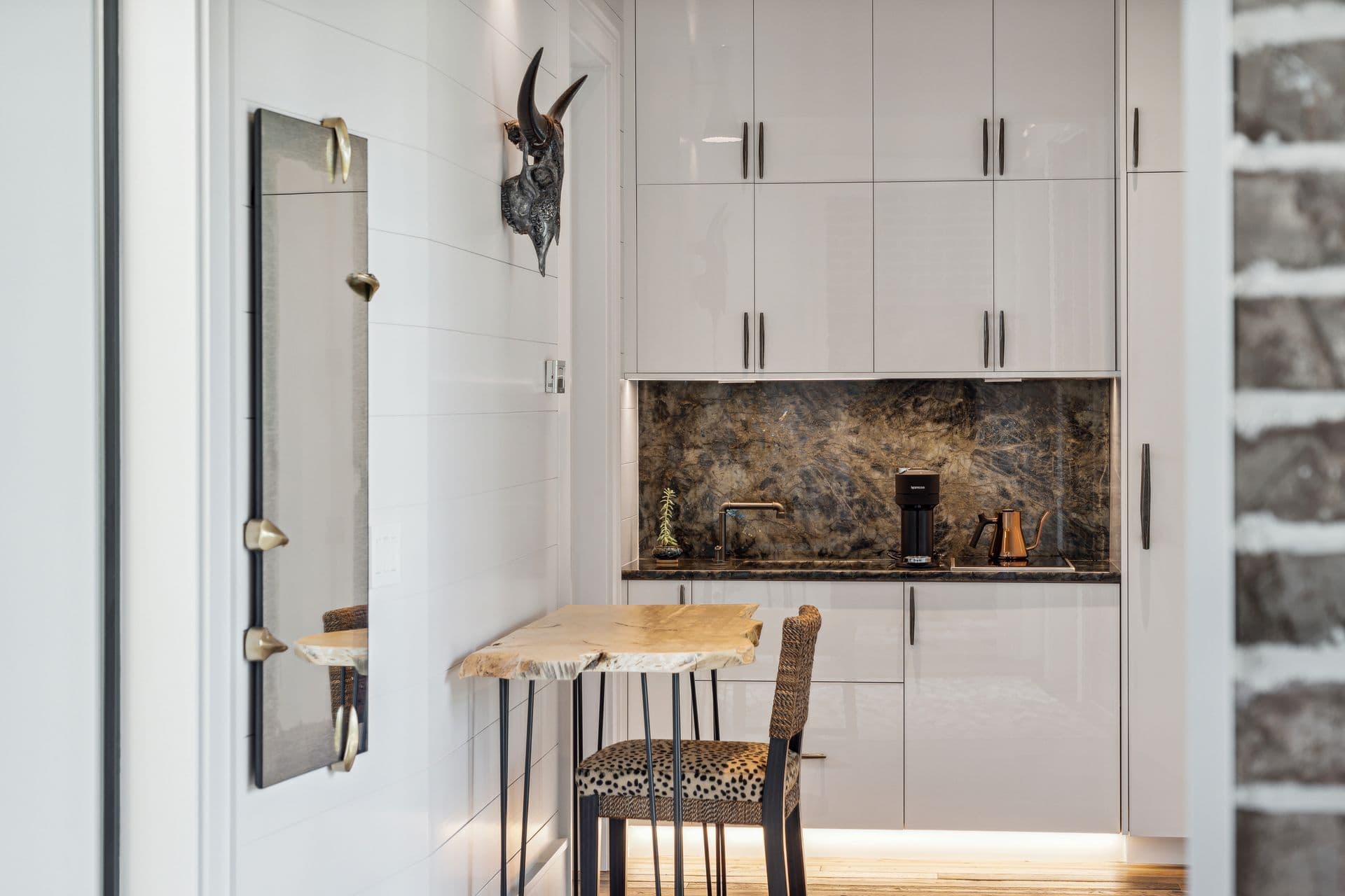 Built-in desk and cabinetry in a bright home office