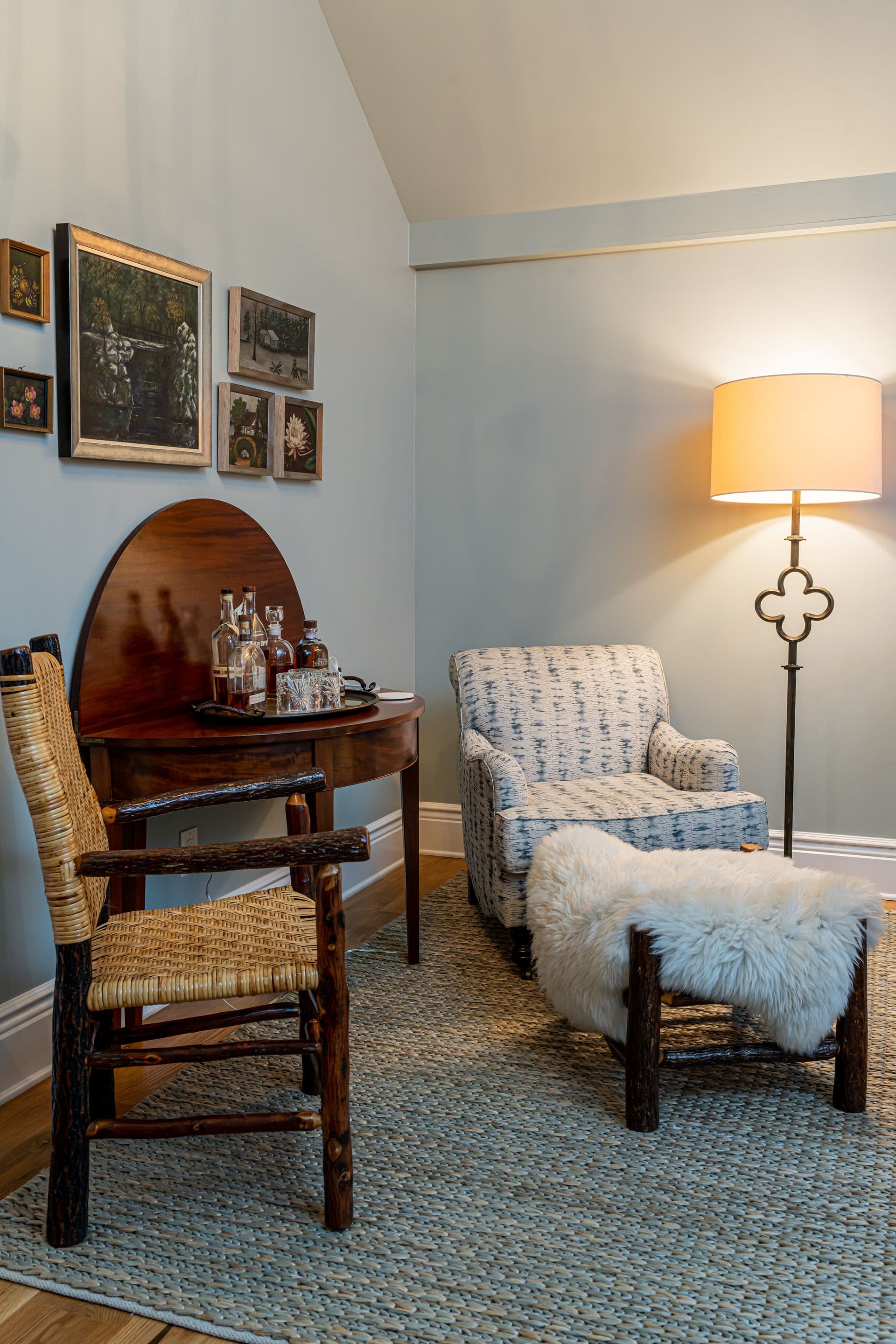 Cozy reading corner with an antique chair and floor lamp