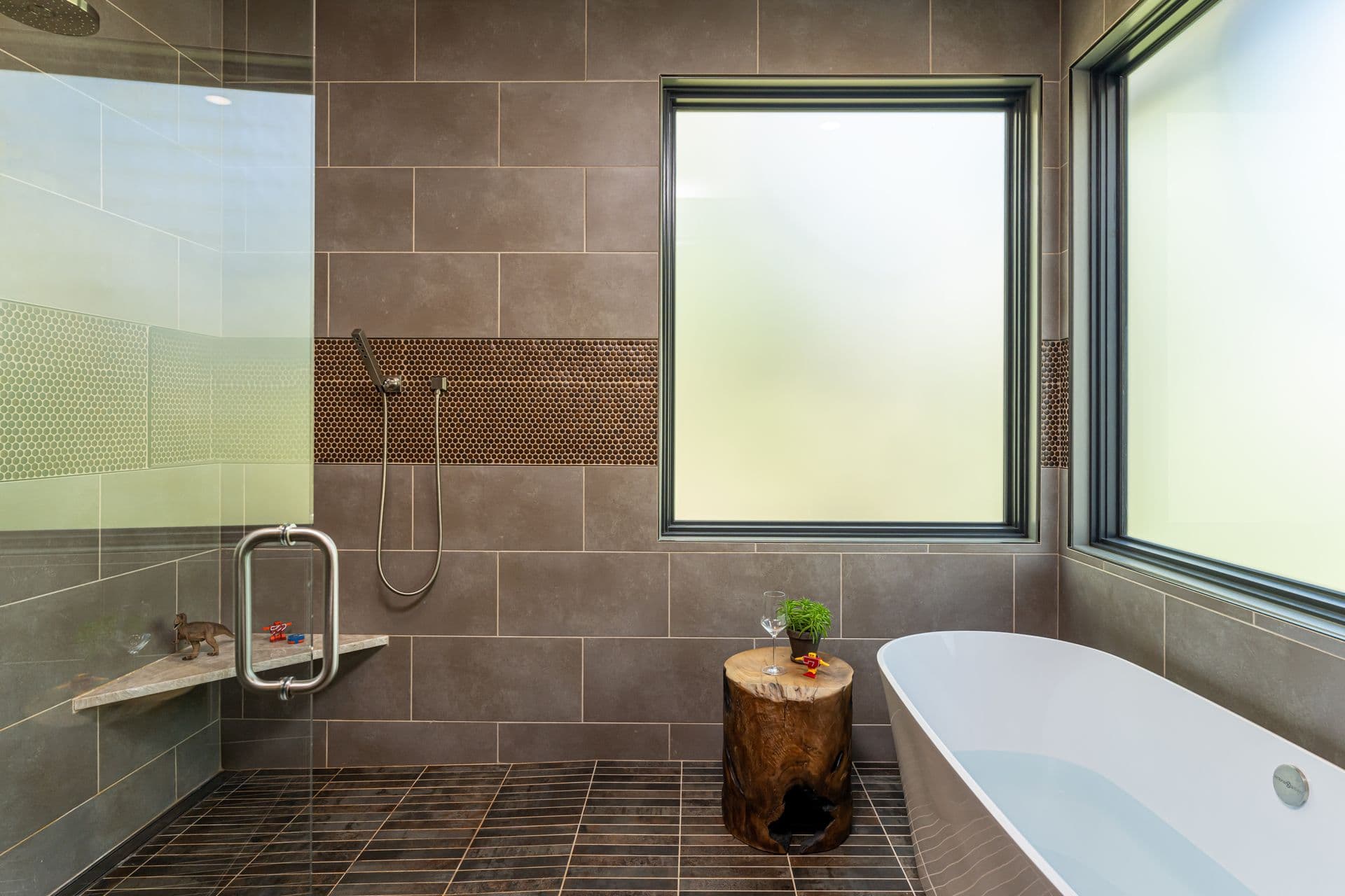 Spa-like wet room with clean lines and earthy finishes